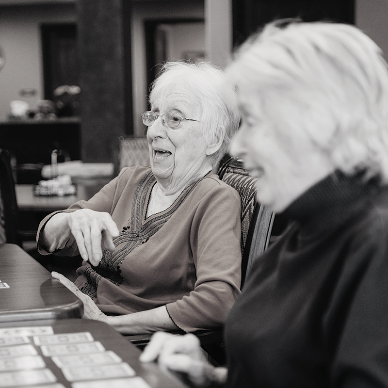 Residents Laughing and playing cards