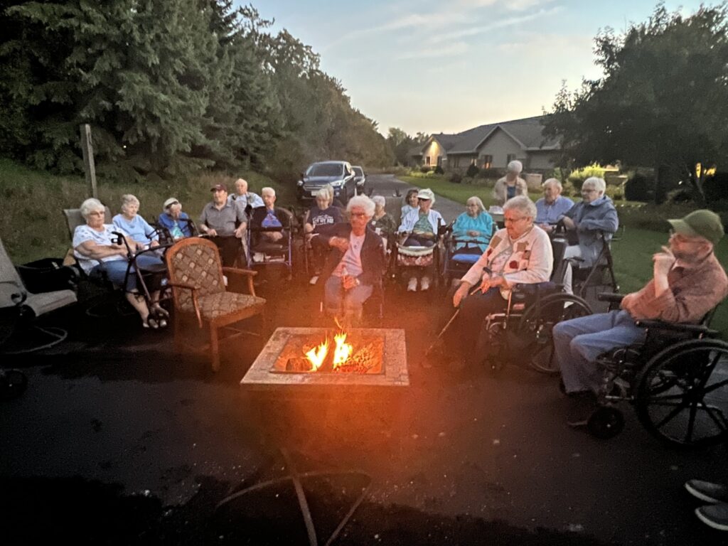 Residents enjoying an outdoor fire pit