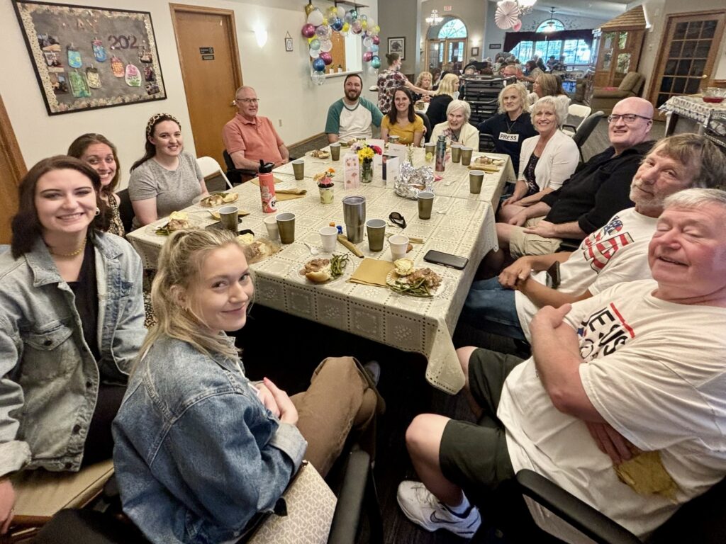 Residents and Families eating together